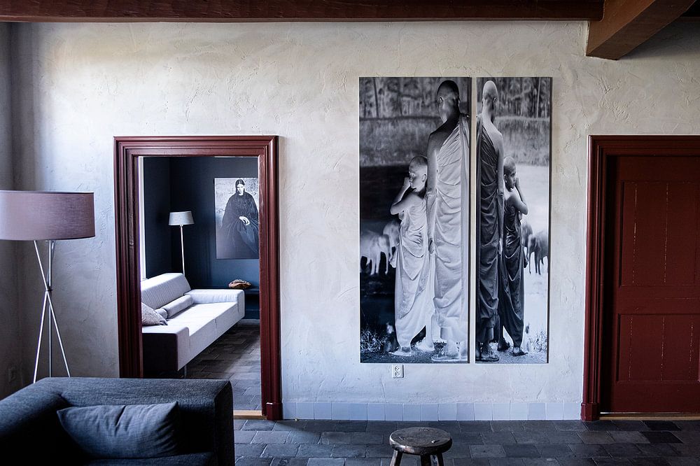 Panel 2 of a diptych Monks watch as young elephants are washed