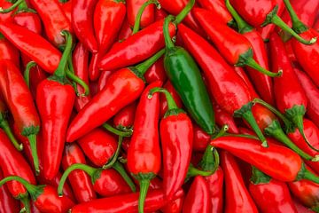 Close-up of red chillies by Doesburg Design