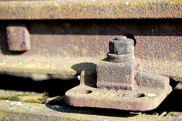 Screw and bolted joint of a railway sleeper in a scrap yard by Heiko Kueverling