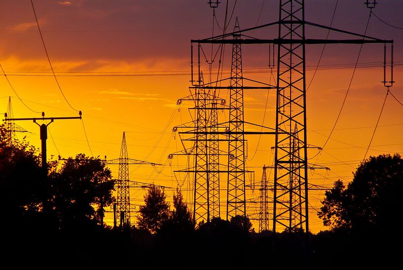 Overhead power lines in the sunset by Norbert Sülzner