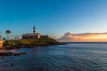 The Barra Lighthouse at the beginning of the twilight in the city of Salvador Brazil