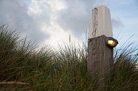 Strandpaal in de duinen 