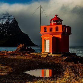Orange lighthouse in Iceland by Miranda Engwerda