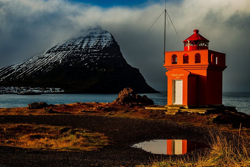 Orange lighthouse in Iceland by Miranda Engwerda