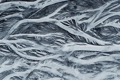 Abstract Aerial View of Frozen River Patterns in Iceland