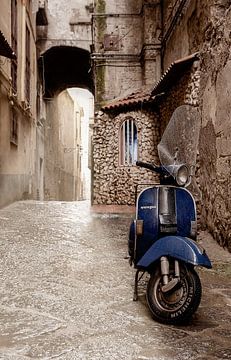 Blue Vespa scooter by Wouter Moné