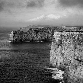 Rugged cliffs at Cabo de São Vicente – understated black and white by Melissa Peltenburg