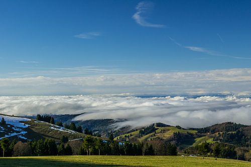 Germany, Above the clouds on a mountain schauinsland on a sunny day with snow by adventure-photos