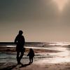 Mother and daughter at the beach by Tammo Strijker