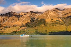 Sailing boat in the Glenorchy Lagoon, New Zealand by Markus Lange