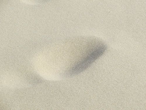voetafdruk op het strand