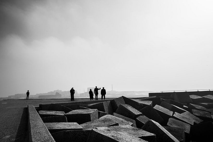 people on a pier by Bert-Jan de Wagenaar