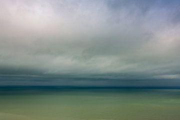 Threatening clouds by the sea by Caroline van der Vecht