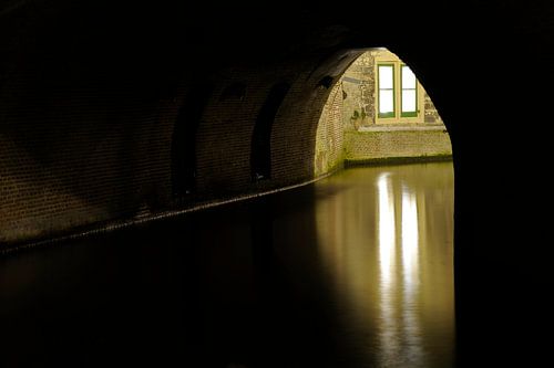 Basement window of Paushuize on Kromme Nieuwegracht in Utrecht