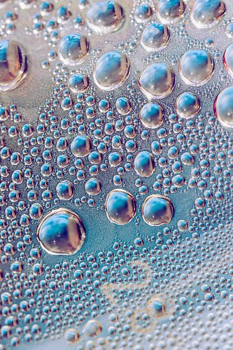 Drops of condensation in soft drink bottle