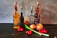 Diverses huiles de cuisson telles que le balsamique de dattes et l'huile d'orange.