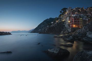 Blue twilight over the fishing village of Riomaggiore. by Stefano Orazzini