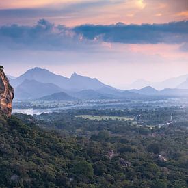 Lion's Rock in landscape where the sun goes down by Eddie Meijer