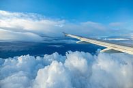 Clouds and airplane wing by Inge van den Brande thumbnail