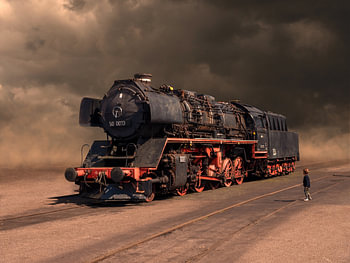 Dampflokomotive von Kind in surrealer Industrielandschaft bewundert