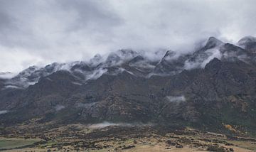 The Remarkables mountains in cloud bed Queenstown by Tom in 't Veld