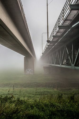Bicycle bridge and car bridge over the IJssel