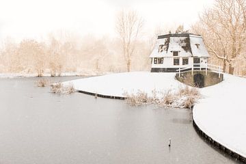 The old mill in the snow