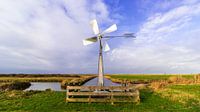 Polderlandschap met windmolentje