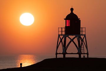 Lighthouse on Stavoren harbour jetty by Armand Hielkema