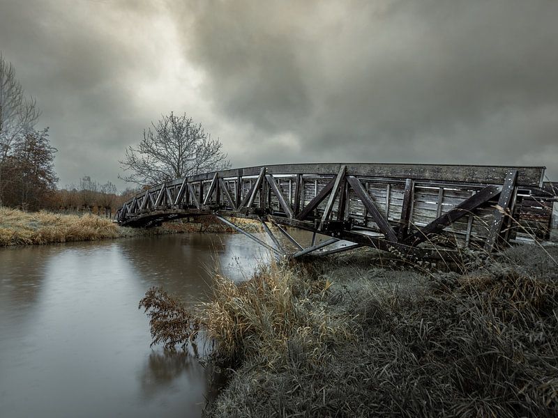 Bridge in Engbergen with threatening sky by Roy Kreeftenberg