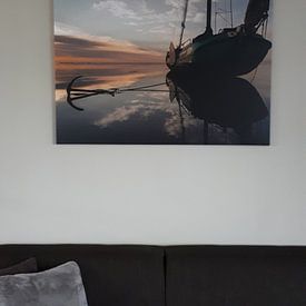 Customer photo: Skutsje lying dry at sunset by Hette van den Brink, on canvas