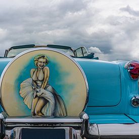 Classic American car with portrait of Marilyn Monroe by mike van schoonderwalt