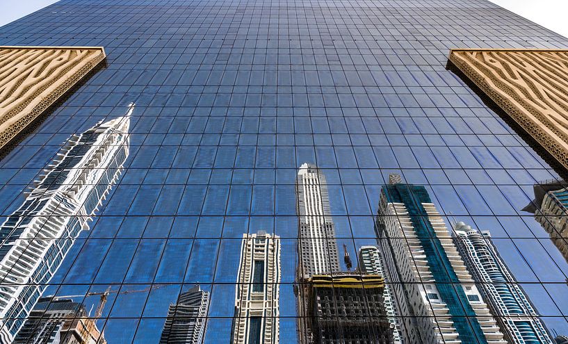 Dubai, mirrored tall buildings by Inge van den Brande