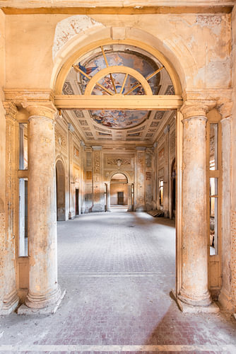 Large hall with frescoes in the abandoned town palace