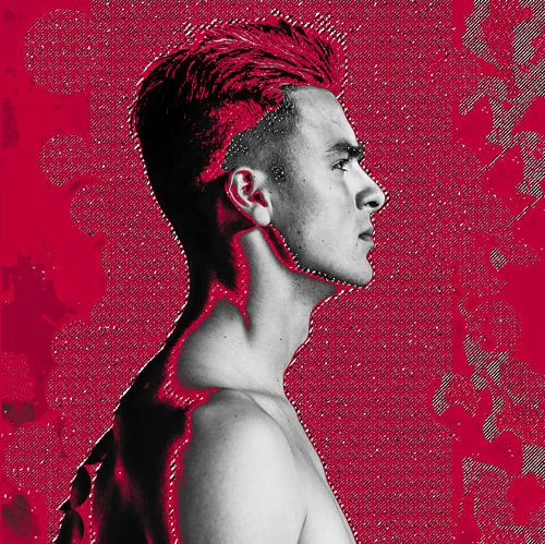 Boy facing the light in red