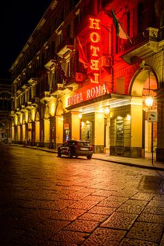 Evening glow: Red-lit Hotel in Turin italy