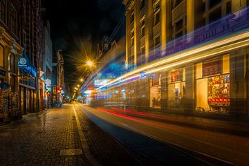 Tram runs through the Leidsestraat by ahafineartimages