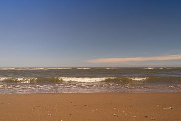 Strand und Wellen