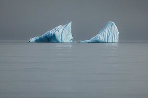 Des icebergs dans un océan lisse - Disko Bay, Groenland sur Martijn Smeets