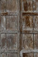 Window with closed wooden shutters