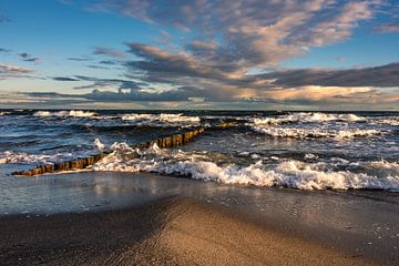 Baltic wavebreaker in the colors of an early morning. by Berthold Ambros