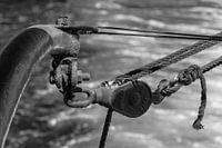 Pulley above water (black and white)