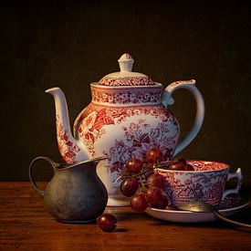 Still life: A cup of tea with a splash of milk by Carola Schellekens