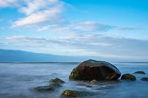 Stones on shore of the Baltic Sea van Rico Ködder