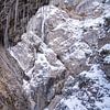 The Gleiersch Gorge in winter with snow, ice, and hanging icicles. von Miriam Schwarzfischer Fotografie