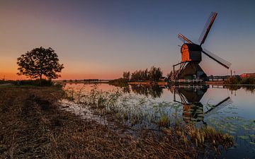 Windmill reflection by Ilya Korzelius
