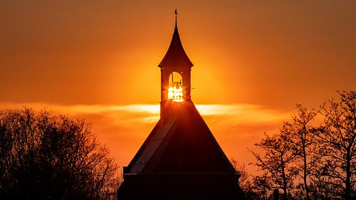 Sunset by the church of Hoedekenskerke