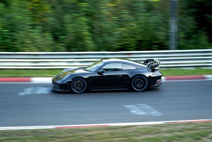 porsche 911 on racetrack by Jim Plaum