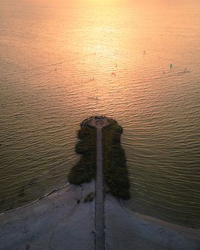 Golden evening light over Makkum beach by Ewold Kooistra