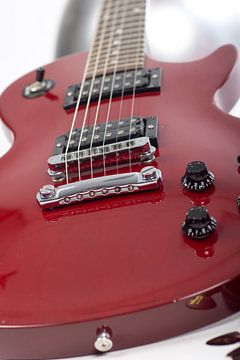 Close up of red Gibson Les Paul guitar by Leoniek van der Vliet